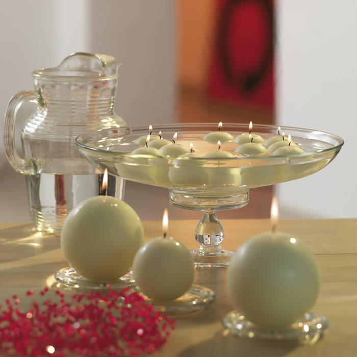 Ivory floating candles and ball candles The London Candle Company Casas de estilo moderno Accesorios y decoración