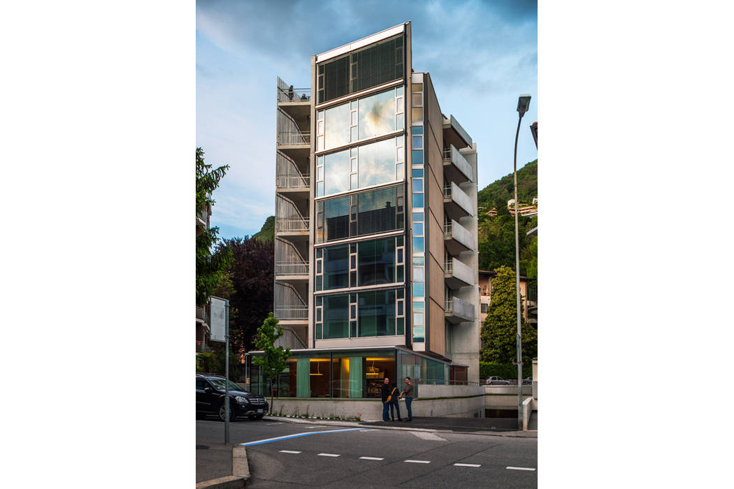 EDIFÍCIO DE APARTAMENTOS EM LUGANO, spbr arquitetos spbr arquitetos Espaços comerciais