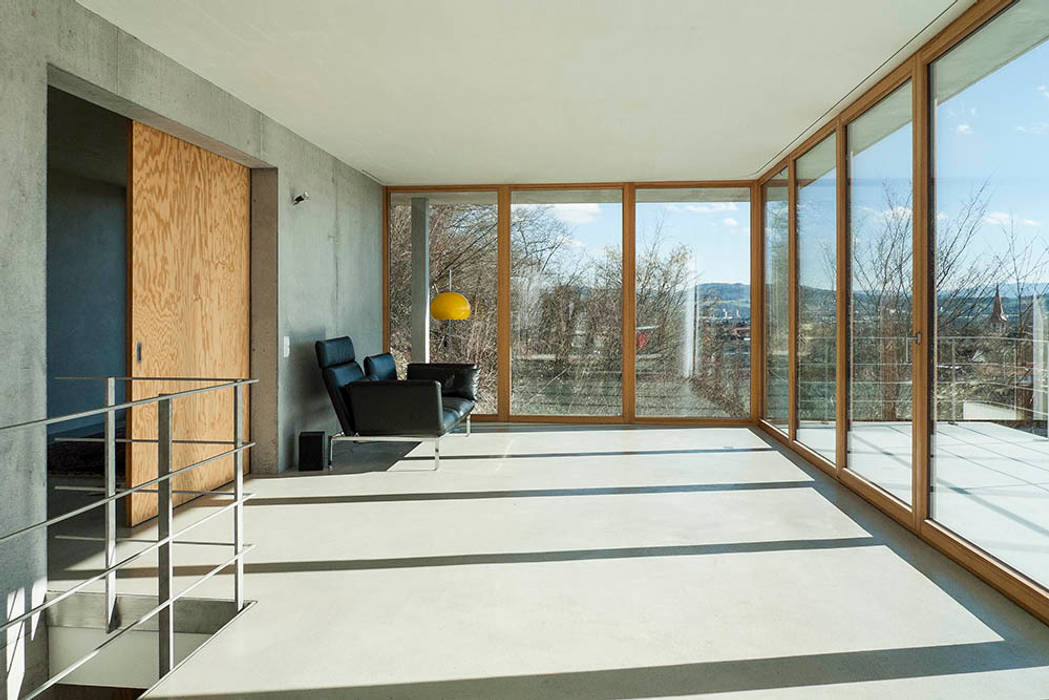 Modernes Traumhaus mit 1a-Aussicht, GIAN SALIS ARCHITEKT GIAN SALIS ARCHITEKT Вітальня