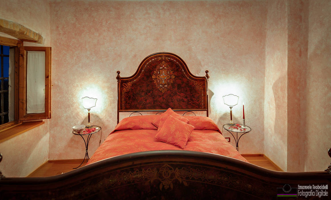 Camer da letto con testata in ferro homify Camera da letto in stile rustico