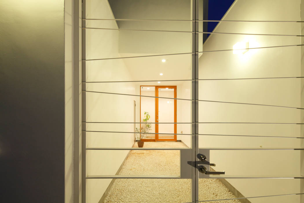Trapezium House, Kichi Architectural Design Kichi Architectural Design モダンスタイルの 玄関&廊下&階段