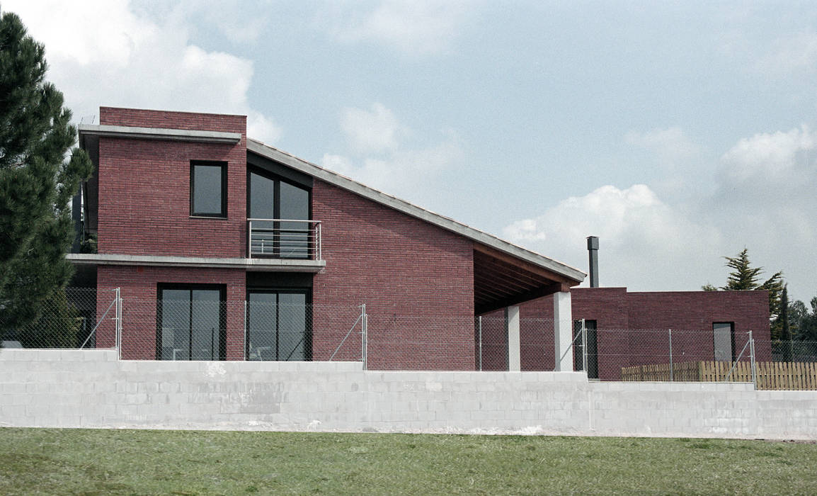 SouthWest façade FG ARQUITECTES Casas modernas