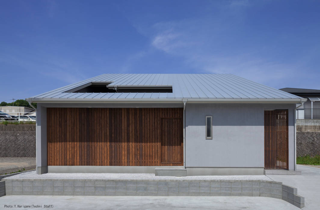 TOHKOU HOUSE, 松岡健治一級建築士事務所 松岡健治一級建築士事務所 Casas de estilo minimalista