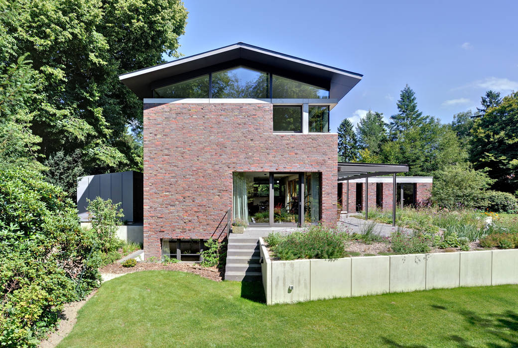 Einfamilienhaus mit schwebendem Dach und Veranda in Bremen, Möhring Architekten Möhring Architekten Modern houses