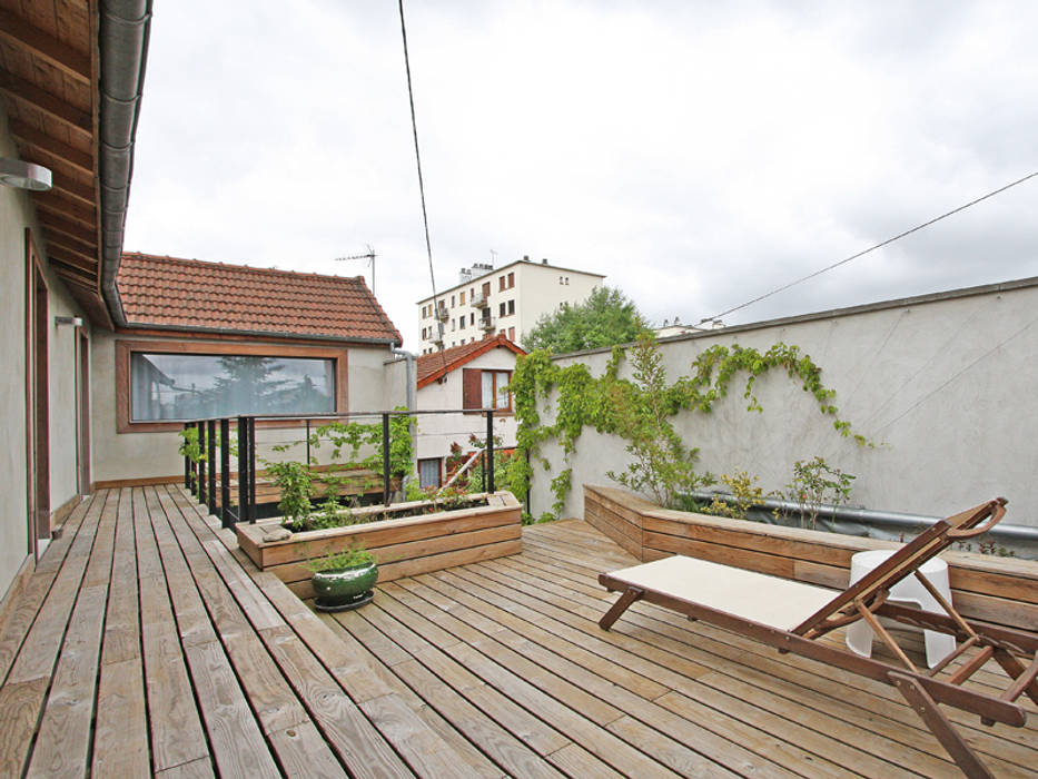 Pavillon transformé en loft, BuroBonus BuroBonus Balcone, Veranda & Terrazza in stile eclettico