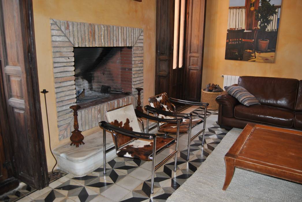 Chimenea de ladrillos antiguos. casas eclécticas de anticuable.com