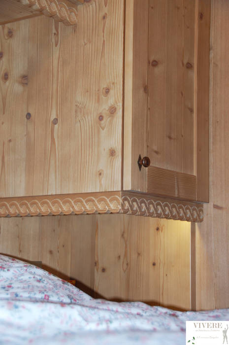 Dettaglio cornice Arredamenti Brigadoi Camera da letto in stile rustico Accessori & Decorazioni