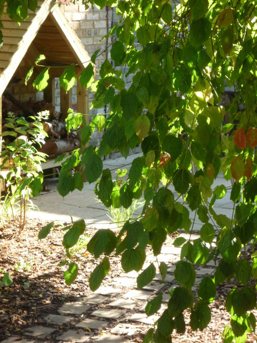 Wood Store Fenton Roberts Garden Design โรงรถและหลังคากันแดด โรงรถและหลังคากันแดด