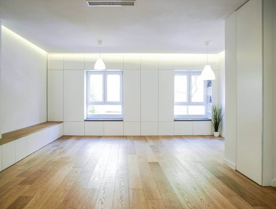 Salón con asientos integrados en ventanas donatecaballero arquitectos