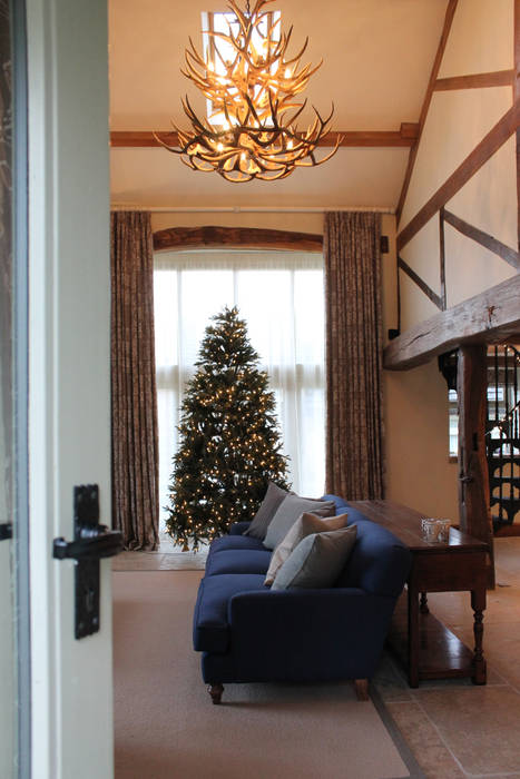 Room Set with the Christmas Tree and Blue Sofa Vanessa Rhodes Interiors Living room