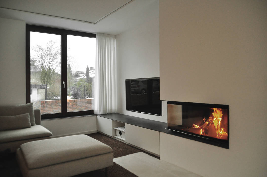 offener Wohnbereich mit Kamin Lecke Architekten Moderne Wohnzimmer