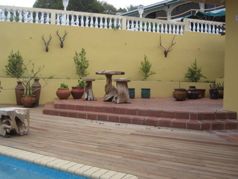 Koloniale villa in Curaçao, Alex Janmaat Interieurs & Kunst Alex Janmaat Interieurs & Kunst Country style balcony, porch & terrace