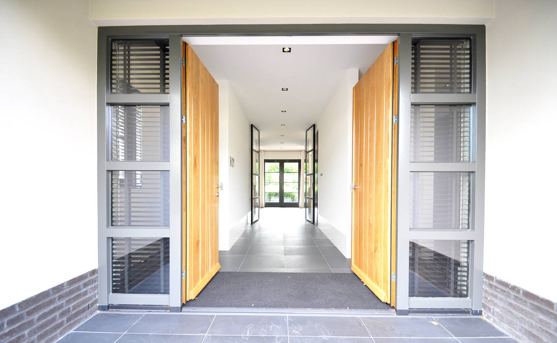 homify Modern corridor, hallway & stairs