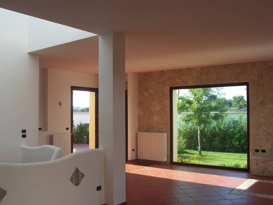 Abitazione a due livelli con giardino, Gianluca Vetrugno Architetto Gianluca Vetrugno Architetto Modern home