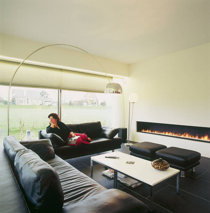 Woonkamer met haard Leonardus interieurarchitect Moderne woonkamers