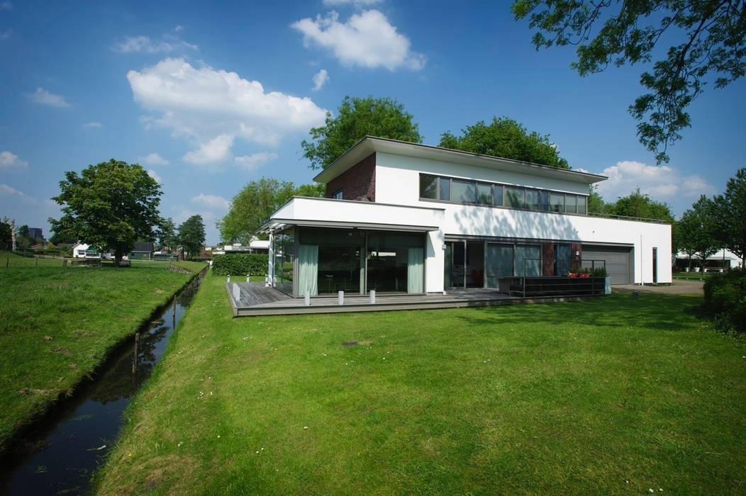 Parkwoning Nootdorp Leonardus interieurarchitect Moderne huizen Wolk,Lucht,Gebouw,Plant,Boom,Venster,land veel,huis,Natuurlijk landschap,Gras