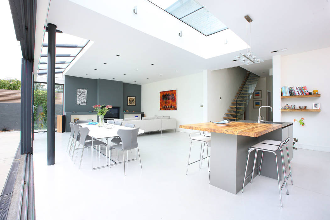 Light and bright living space PAD ARCHITECTS Salle à manger moderne Tables