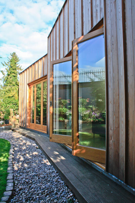 Bi-folding doors to rear elevation Neil Dusheiko Architects บ้านและที่อยู่อาศัย