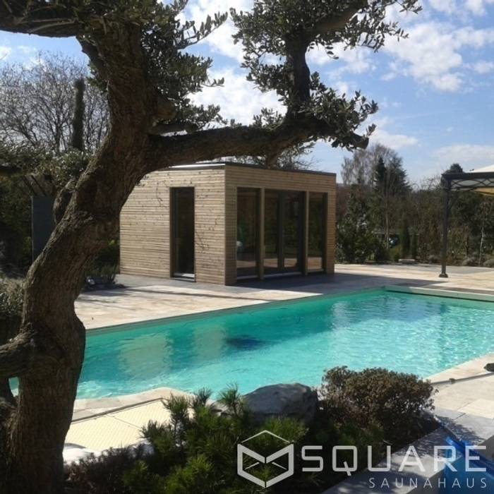 Saunahaus SQUARE XL als Poolhaus mit Sauna - Fassade: Lärchenholz-Rhombusprofil , SQUARE Saunahaus SQUARE Saunahaus Спальня