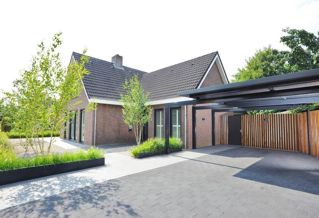 Vrijstaande woning met uitzicht over het landschap , Hendriks Hoveniers Hendriks Hoveniers モダンな庭