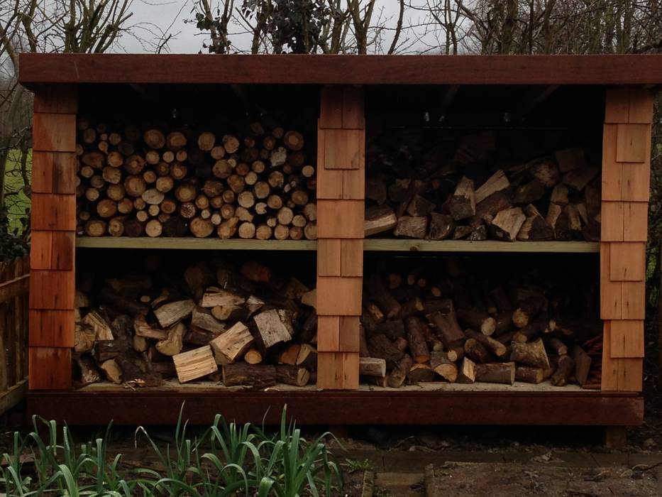 Bespoke woodstore built with utilising cedar shingles. Westacott Gardens