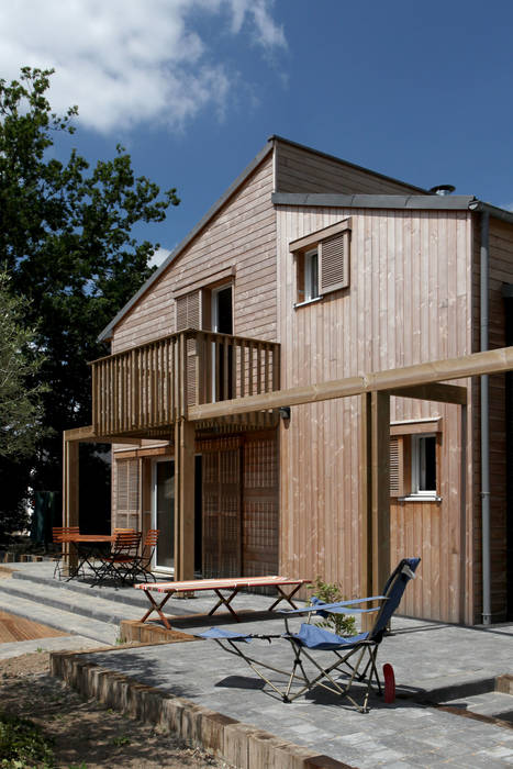 UNE MAISON BIOCLIMATIQUE À AURAY, Patrice Bideau a.typique Patrice Bideau a.typique Casas modernas