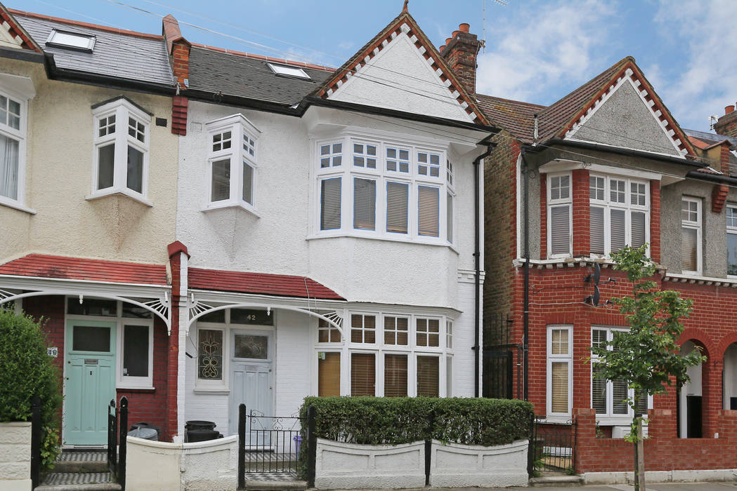 ​hip to gable loft conversion wimbledon homify Casas modernas