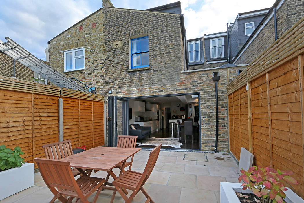 ​kitchen side return extension balham with flat roof and sky lights homify Modern Evler