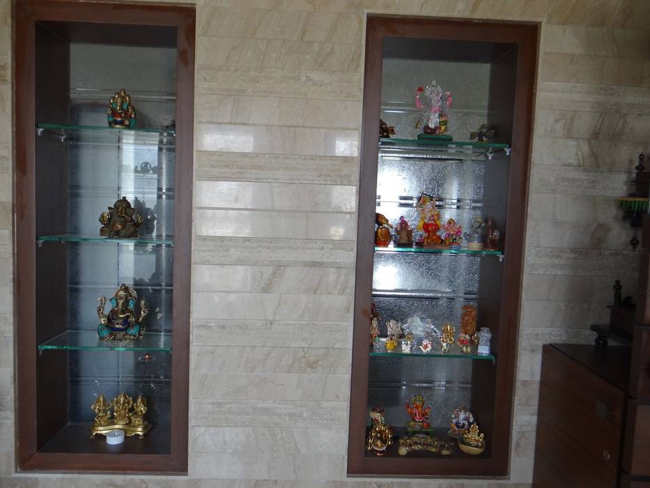 niches in the pooja room to display the Ganesha collection of the client homify Modern walls & floors