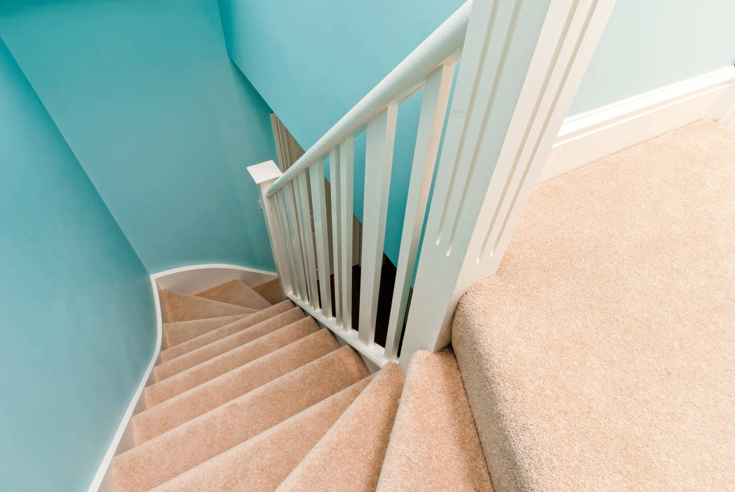 over existing spiral stairs A1 Lofts and Extensions Mediterranean style corridor, hallway and stairs