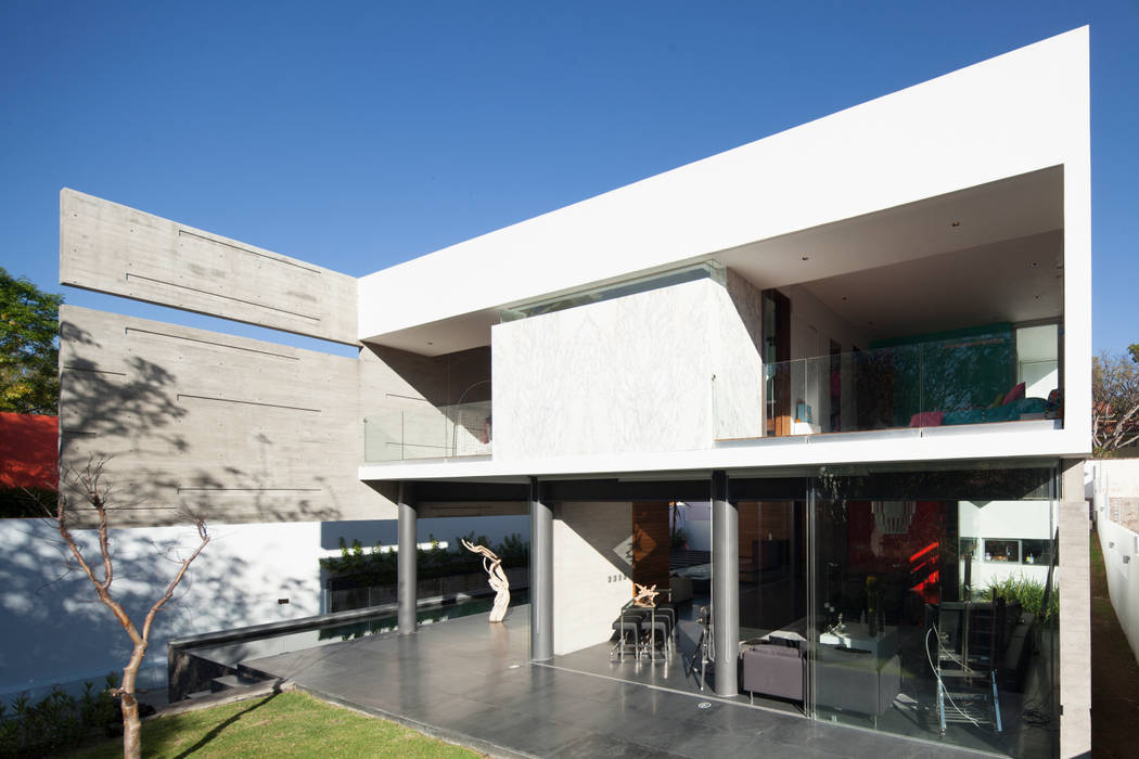 Casa Rinconada., Echauri Morales Arquitectos Echauri Morales Arquitectos Case in stile minimalista