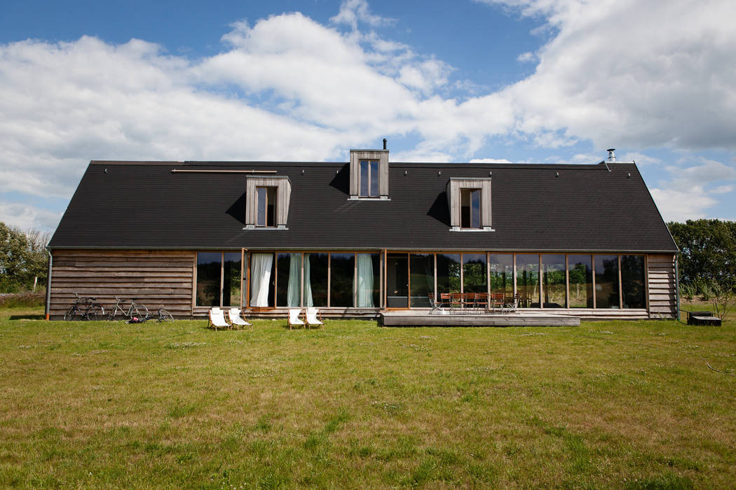 Aussenfassade, Gartenseite Das schwarze Haus Gewerbeflächen Hotels