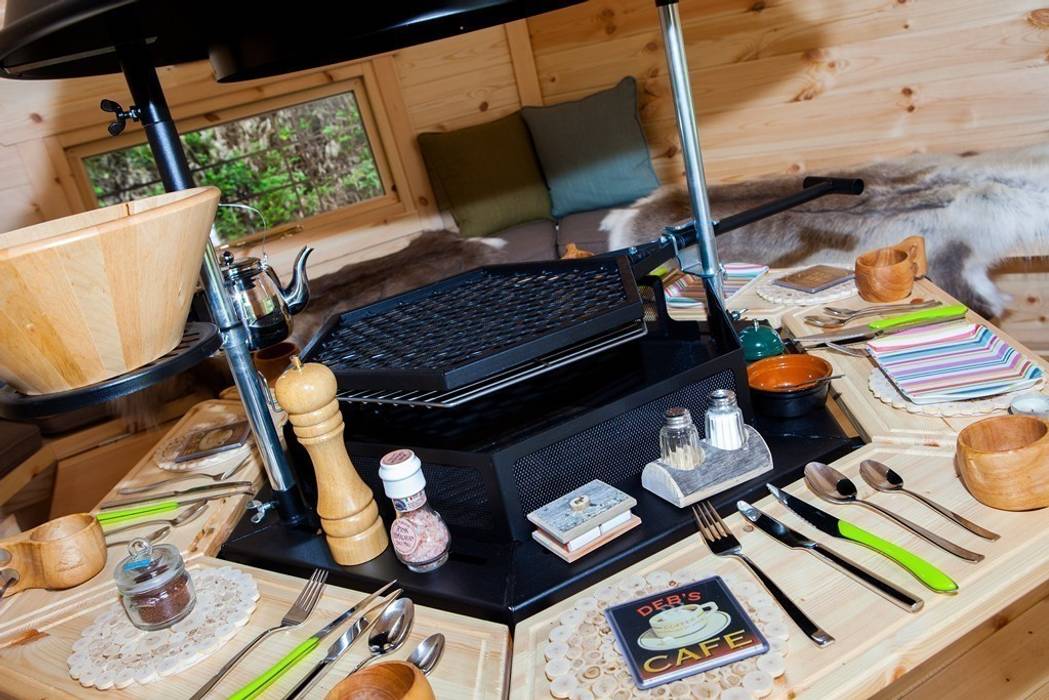 The interior of a 10m² Barbecue Cabin in a Derbyshire garden. Arctic Cabins Scandinavian style garden