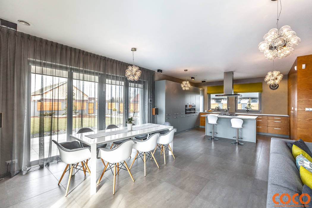 Salas de jantar minimalistas por COCO Pracownia projektowania wnętrz Minimalista