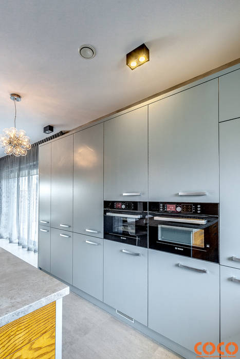 Cozinhas minimalistas por COCO Pracownia projektowania wnętrz Minimalista