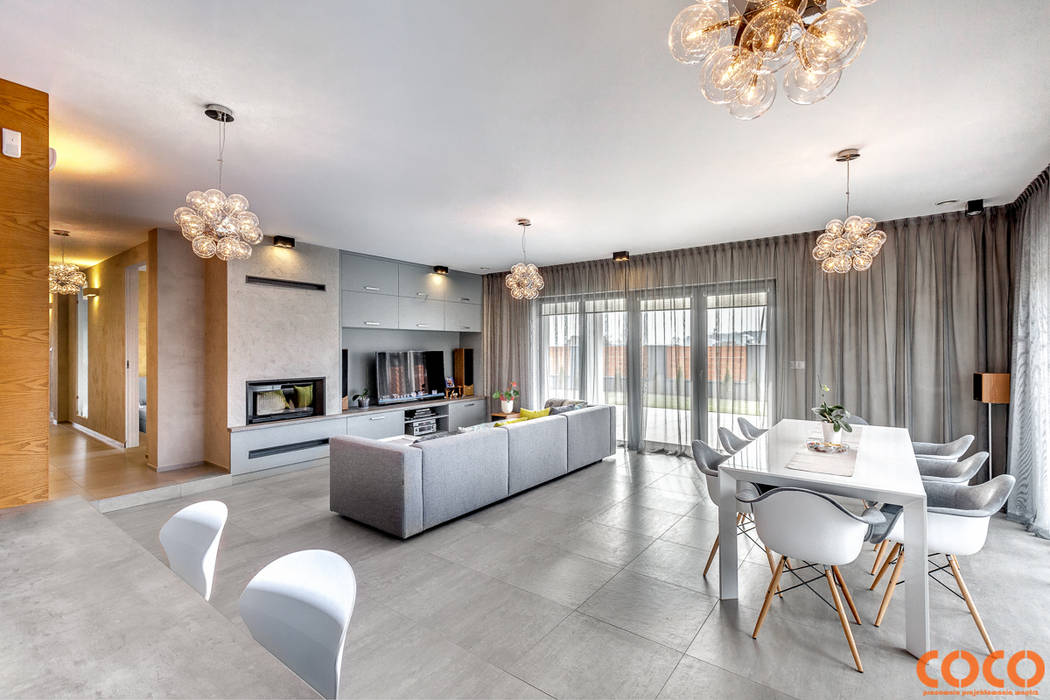 Salas de estar minimalistas por COCO Pracownia projektowania wnętrz Minimalista