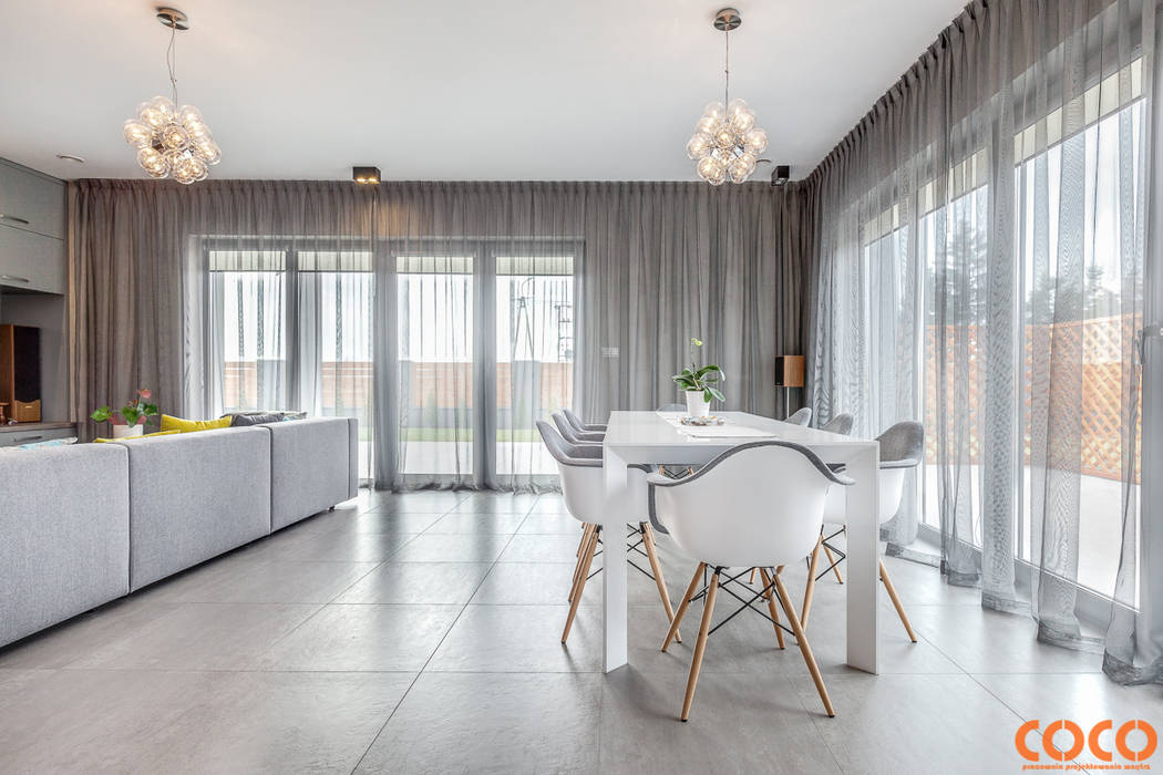 Salas de jantar minimalistas por COCO Pracownia projektowania wnętrz Minimalista