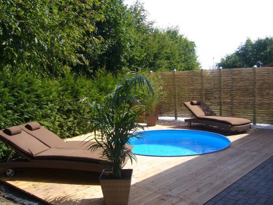 Nachhaltig, stilvoll, vielseitig: moderner Sichtschutz aus Bambus, GH Product Solutions GH Product Solutions Tropical style gardens Swim baths & ponds