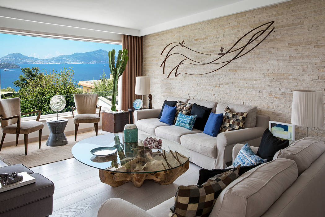 Casa Monte di Procida: Una casa dei primi del novecento su due piani con ampia vista sul mare, PDV studio di progettazione PDV studio di progettazione Mediterranean style living room Sofas & armchairs