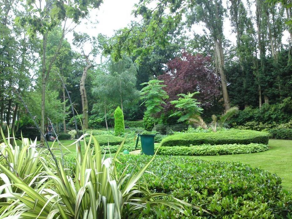 Garden maintenance Greenmans Yard Jardines de estilo tropical