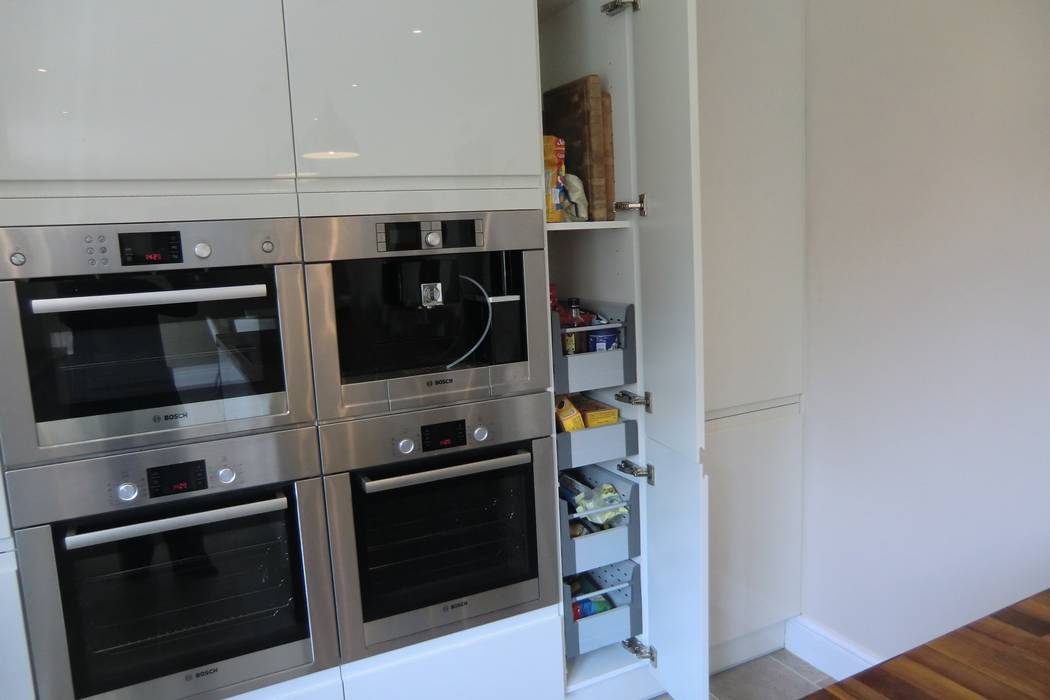 Tall dynamic storage and Bosch appliances Harvey's Select Modern kitchen Storage