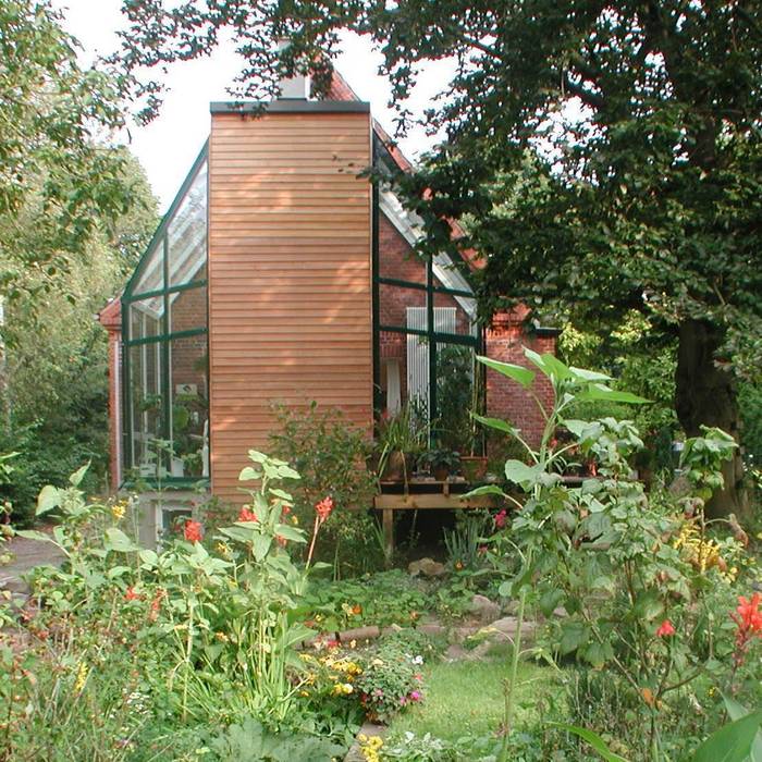 Anbau eines Wintergartens an ein Einfamiliehaus mit energetischer Gebäudesanierung, Architekt R-M Birkner Architekt R-M Birkner Nowoczesny ogród zimowy