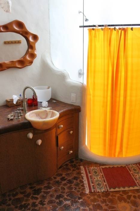 Casa Santa Fe, Cenquizqui Cenquizqui Rustic style bathrooms Storage