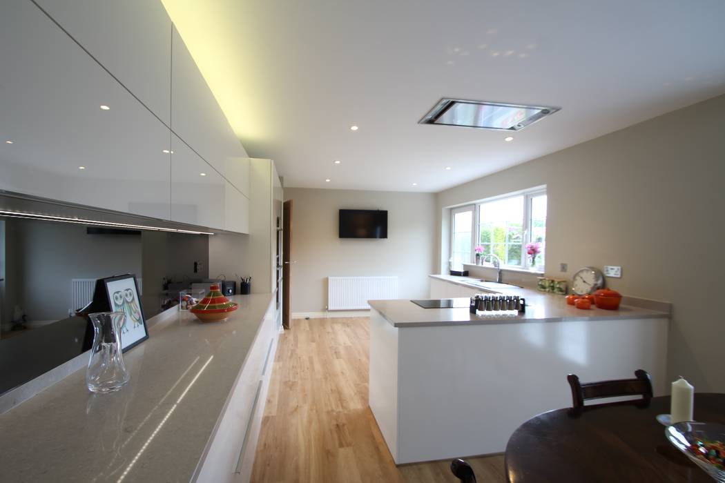 White gloss Schuller handled with Neff appliances and Ceaserstone worktops AD3 Design Limited Modern kitchen