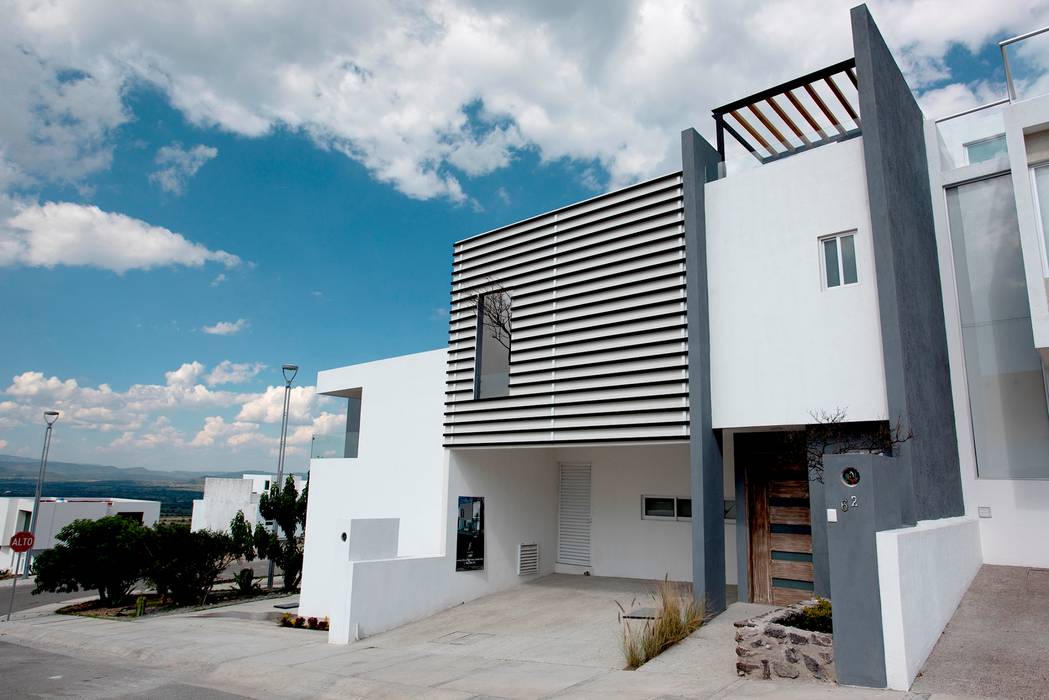 Fachada JF ARQUITECTOS Casas minimalistas