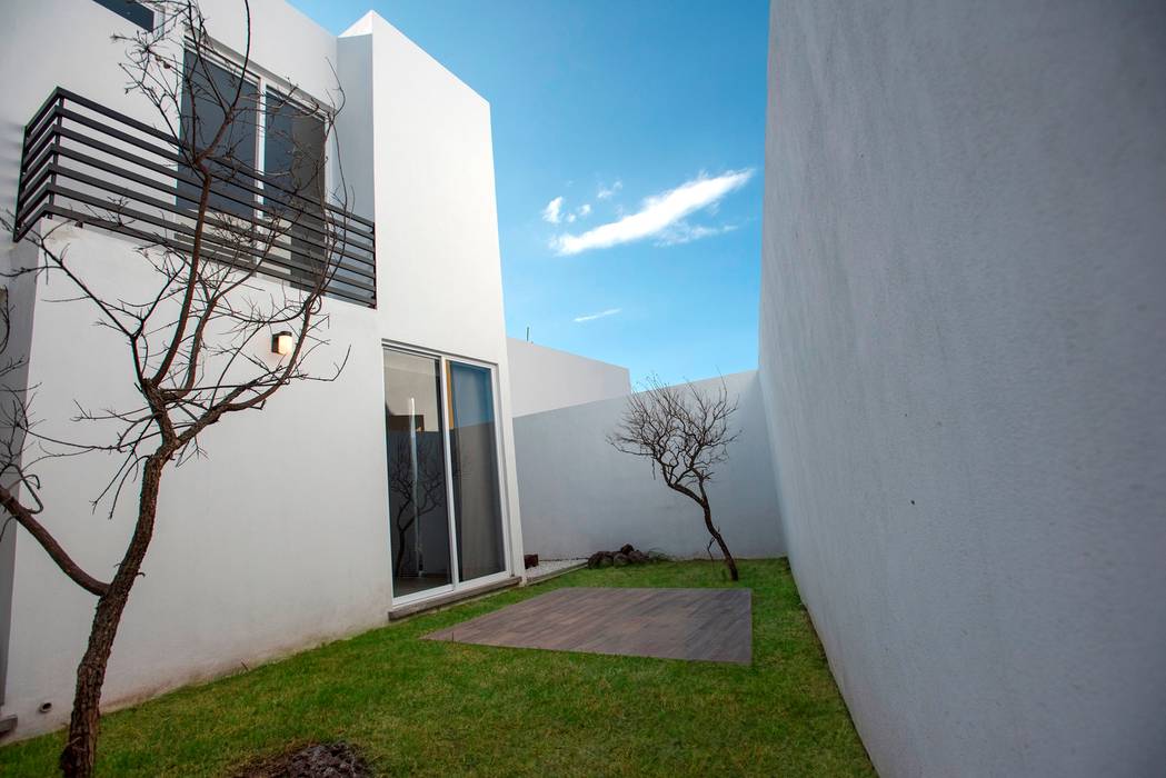 Casa Pitahayas 62, Zibatá, El Marqués, Querétaro, JF ARQUITECTOS JF ARQUITECTOS Giardino minimalista