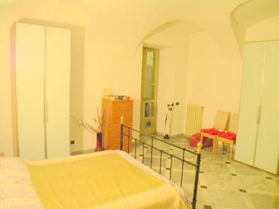la camera da letto (prima) Paola Boati Architetto Camera da letto in stile classico