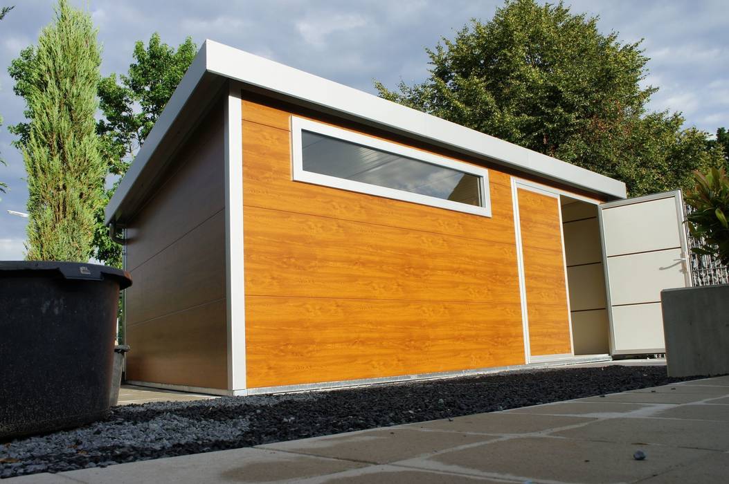 homify Modern garage/shed