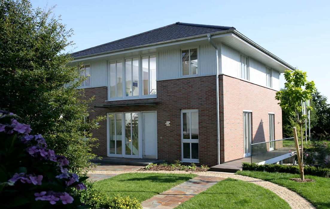 Verklinkerte villa für die stadt häuser von haacke haus