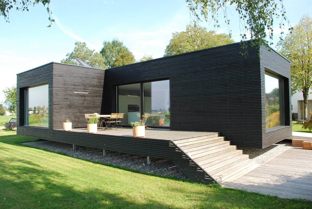 Gartenansicht schroetter-lenzi Architekten Moderne Häuser Himmel,Anlage,Baum,Gebäude,Schatten,Grundstück,Holz,Gras,Wohngebiet,Immobilie